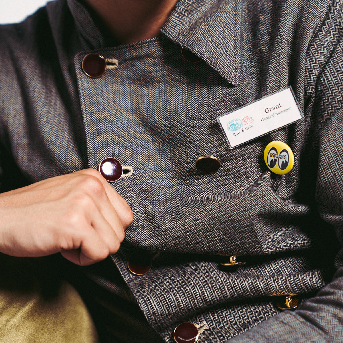grentperez wearing a unique badge that says grant general manager